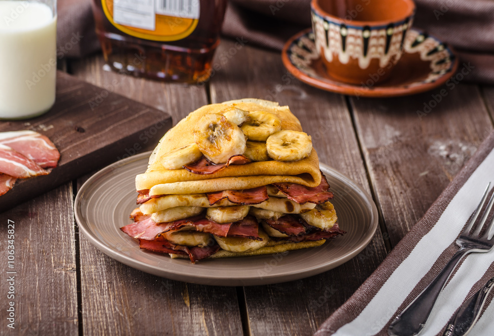 Pancakes with bacon, banana and maple sirup Pancakes with bacon, banana and maple sirup
