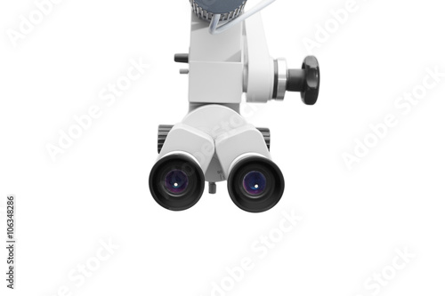 Ear microscope on white background photo