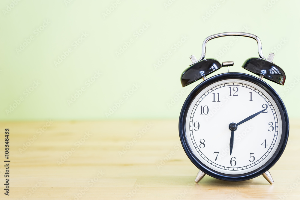alarm clock on wood table alarm clock on wood table