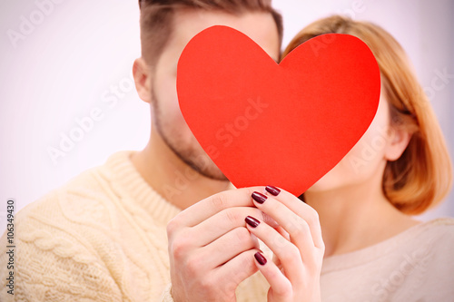 Young couple in love holdin...