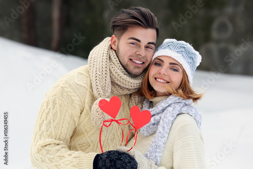Young couple in love holdin...