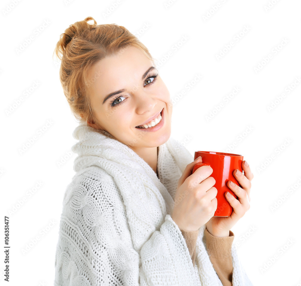 Beautiful girl enjoying a cup of tea, isolated on white