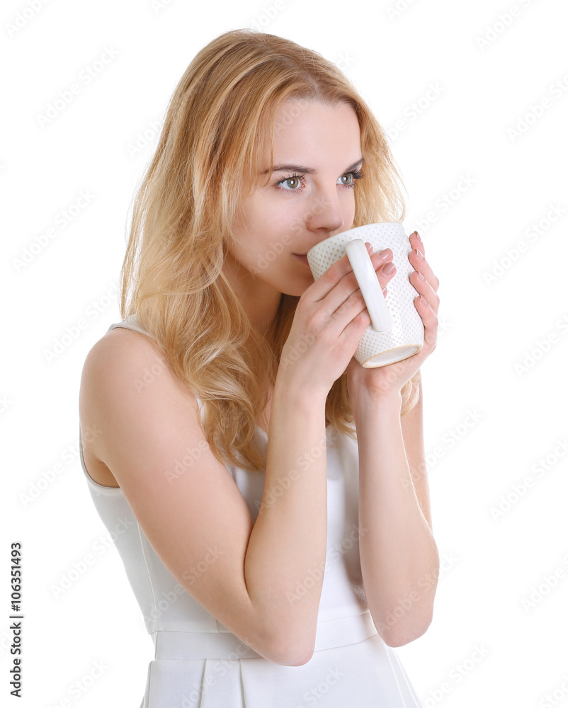Beautiful girl enjoying a cup of tea, isolated on white Beautiful girl enjoying a cup of tea, isolated on white