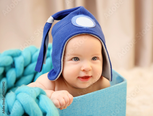 Adorable baby in funny hat ...