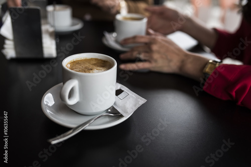 Coffee cup on table in cafe