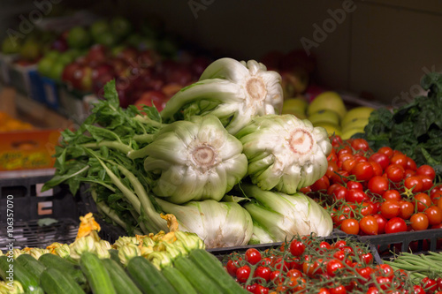 Market with various colorful fresh vegetables