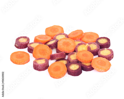 Sliced organic carrots separated on white background