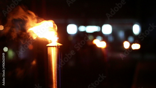 night with flaming torches