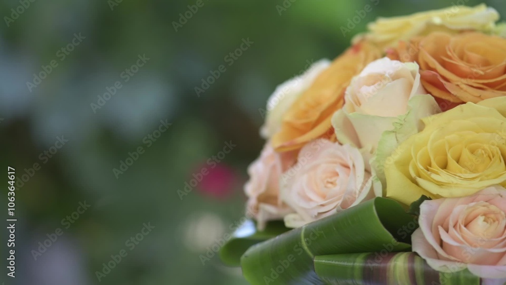 Bride's bouquet rotation against green background Bride's bouquet rotation against green background