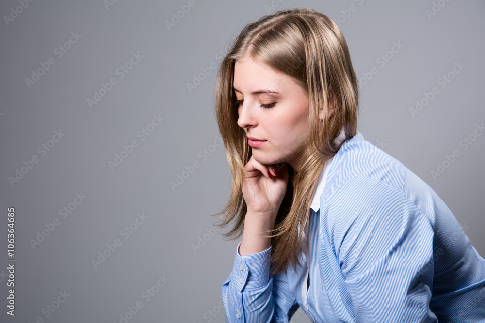 A Cute Girl Thinking With Hand On Side Of Face