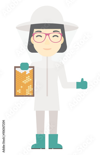 Bee-keeper at apiary.