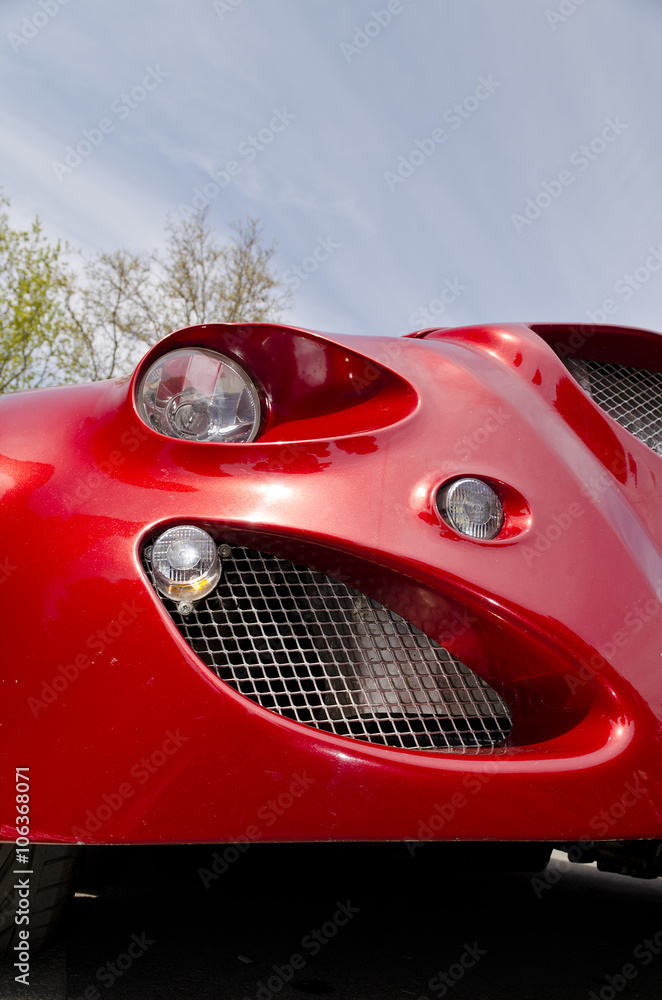 Detail of a vintage car light in colours