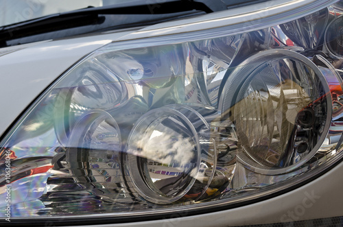 Closeup image of a modern car head lamp