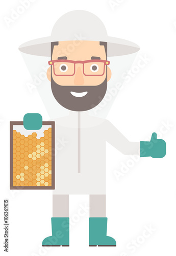 Bee-keeper at apiary.
