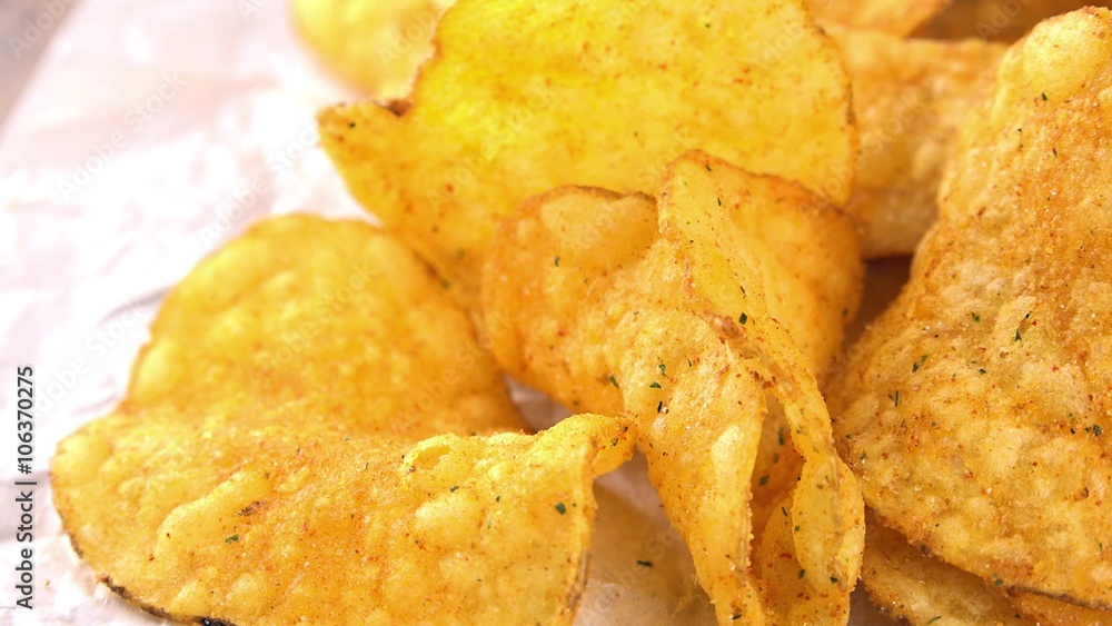 Portion of rotating Potato Chips as not loopable 4K UHD footage Portion of rotating Potato Chips as not loopable 4K UHD footage