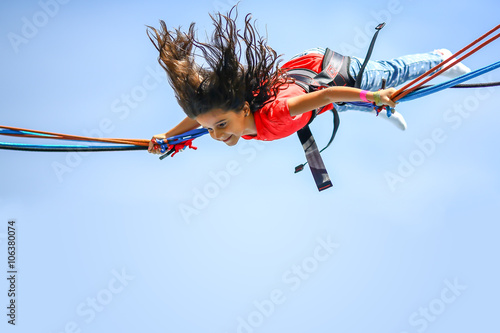Girl bungee jumping trampoline Top