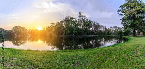 Beautiful urban lake in middle of city at sunset.