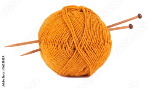 Yellow knitting yarn on isolated white