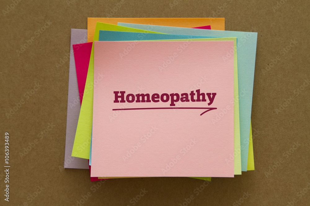 Homeopathy word written on a sticky note. Homeopathy word written on a sticky note.