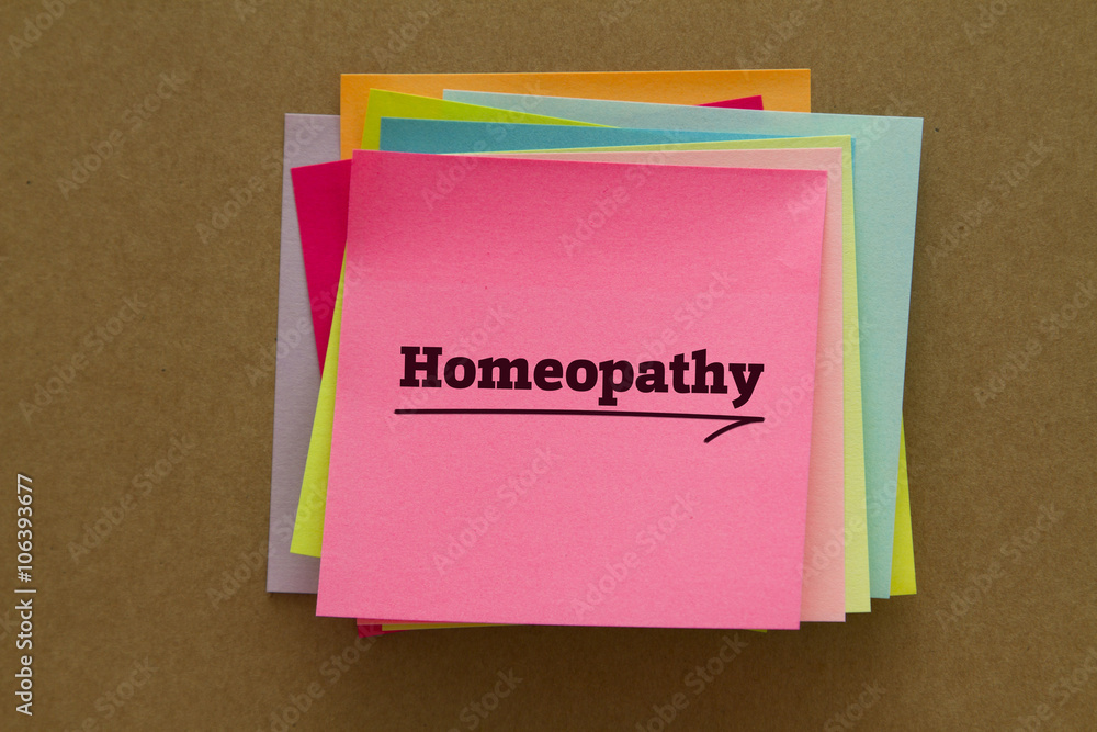 Homeopathy word written on a sticky note. Homeopathy word written on a sticky note.