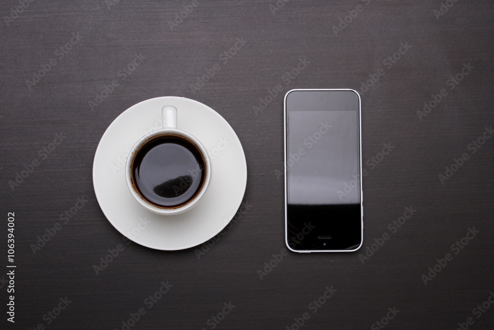 Smart phone and Coffee Cup, top view Smart phone and Coffee Cup, top view