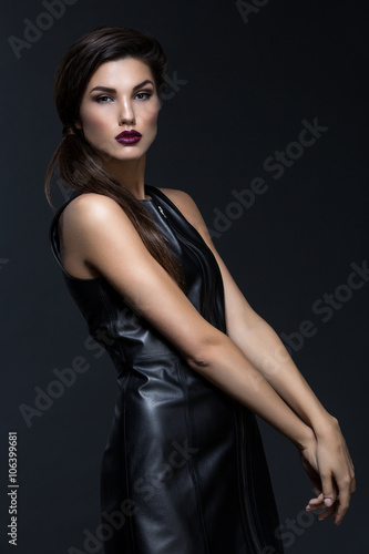 Girl in fancy leather dress