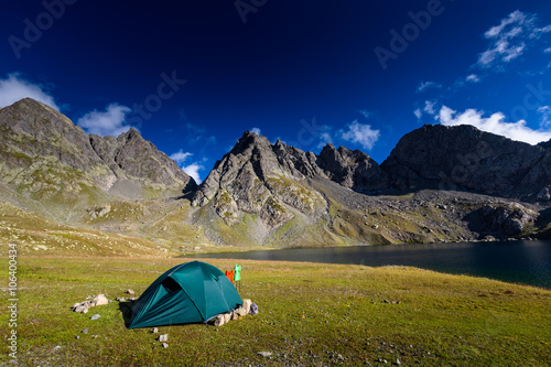 Camping near lake in high Caucasus mountains in Georgia
