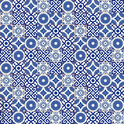 Stylish seamless pattern patchwork mix of five Moroccan tiles in trendy shades of blue.
