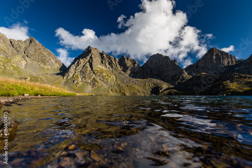 Picturesque lake in valley of Caucasus mountains in Georgia