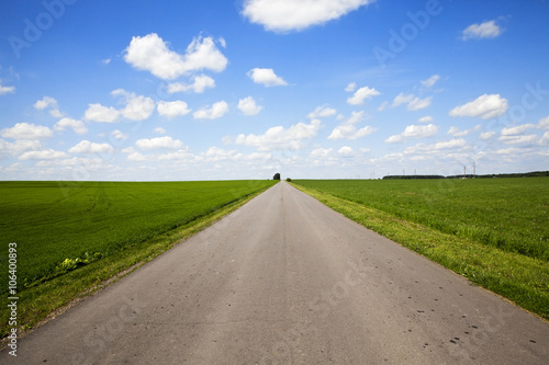 road in a field  