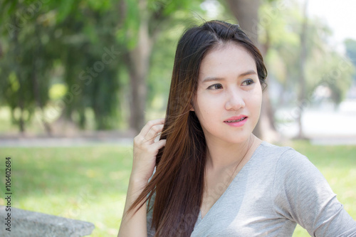asia thai adult woman beautiful girl relax and smile in the garden