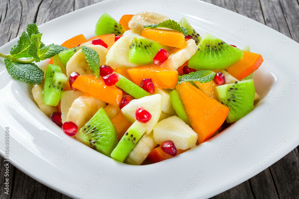 fruit salad in a wide rim square plate, close-up, top-view fruit salad in a wide rim square plate, close-up, top-view