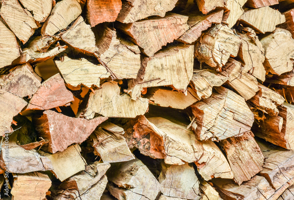 Stack of chopped stump for fire supply in cold season Stack of chopped stump for fire supply in cold season