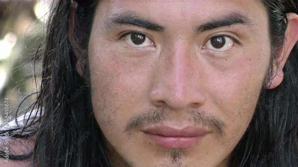 Captivating close up shot of a remarkably expressive indigenous person in the enchanting Ecuadorian Amazonia,showcasing the rich cultural heritage and diversity of the region. Captivating close up shot of a remarkably expressive indigenous person in the enchanting Ecuadorian Amazonia,showcasing the rich cultural heritage and diversity of the region.