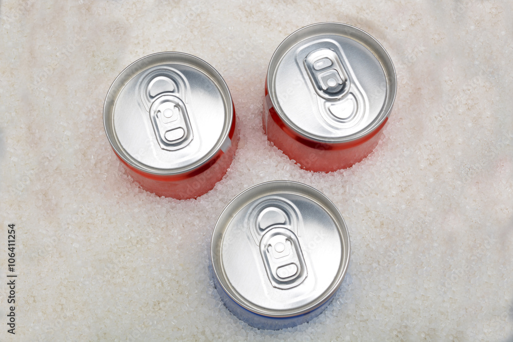 Sugar in carbonated drinks. sweet background and canned drinks concept Sugar in carbonated drinks. sweet background and canned drinks concept