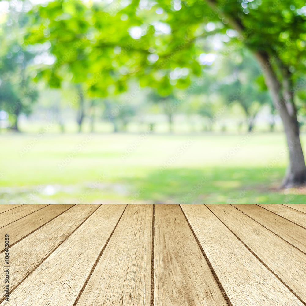 Perspective wood over blur trees with bokeh background Perspective wood over blur trees with bokeh background
