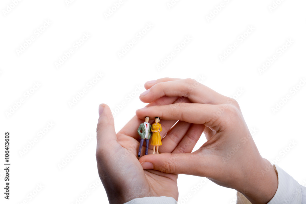 Fototapeta premium figurine model men in hand