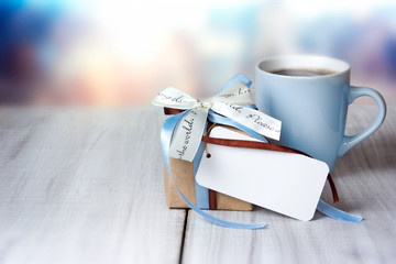 Father's day holiday greeting card empty space.Present box mug.