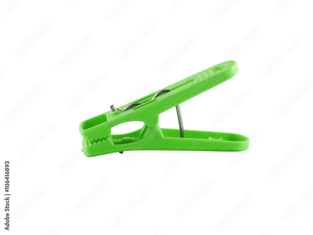 Green clothes peg isolate white background with copy space Green clothes peg isolate white background with copy space