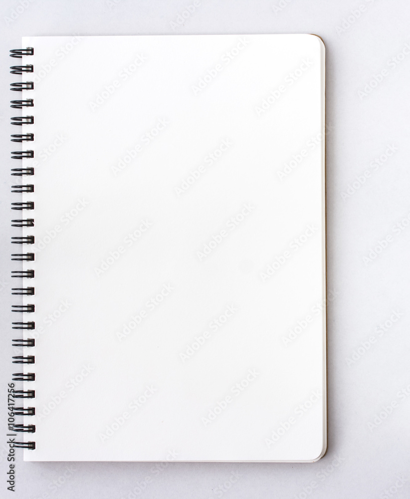Open Small notepad on white background Open Small notepad on white background