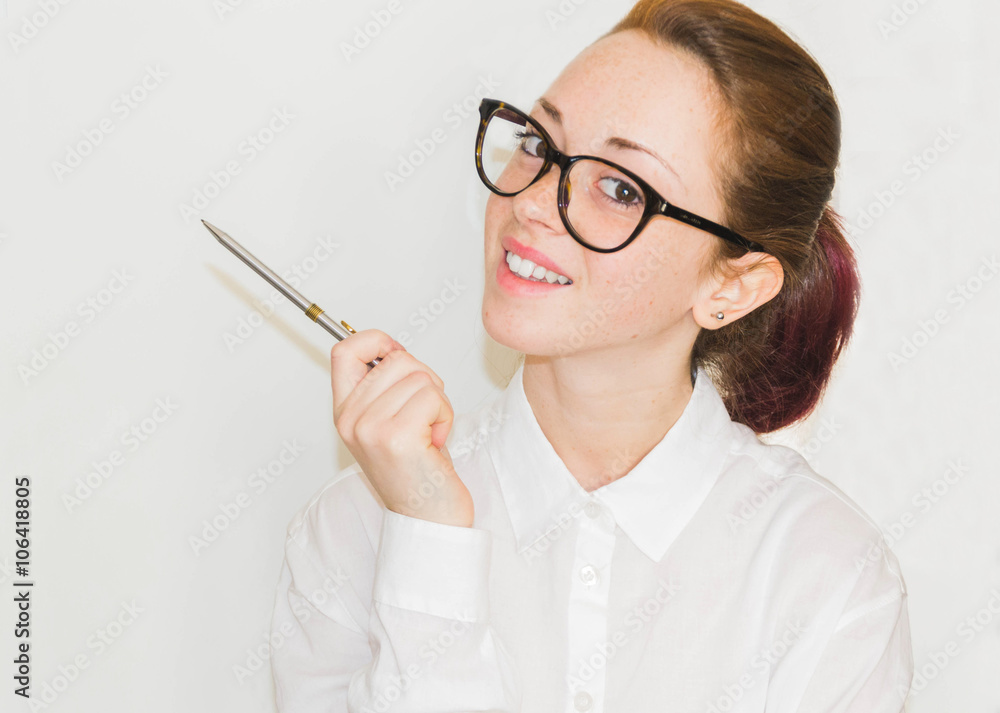 Portrait of smiling business woman, isolated on white background,with a pen in hand - work and business concept Portrait of smiling business woman, isolated on white background,with a pen in hand - work and business concept