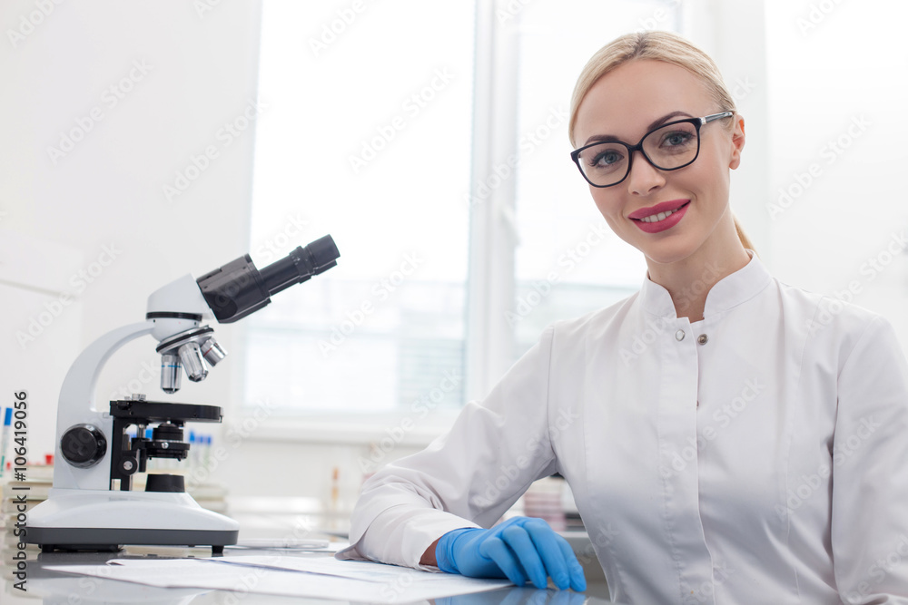 Skillful female researcher is expressing positive emotions Skillful female researcher is expressing positive emotions