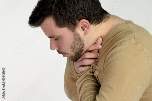 first aid - young man choking over a white background