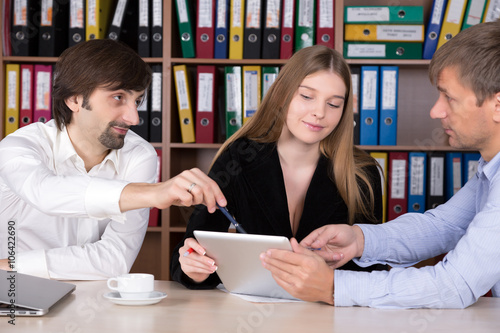 Group of People discussing Business Subject at Office