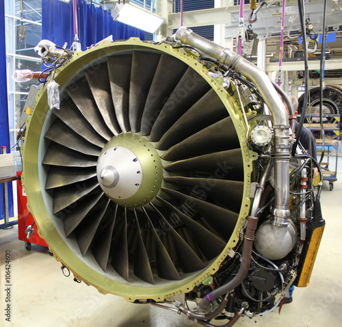 Jet engine during maintenance inside hangar