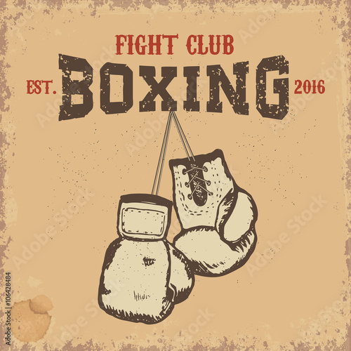 Boxing club. Boxing gloves on grunge background.