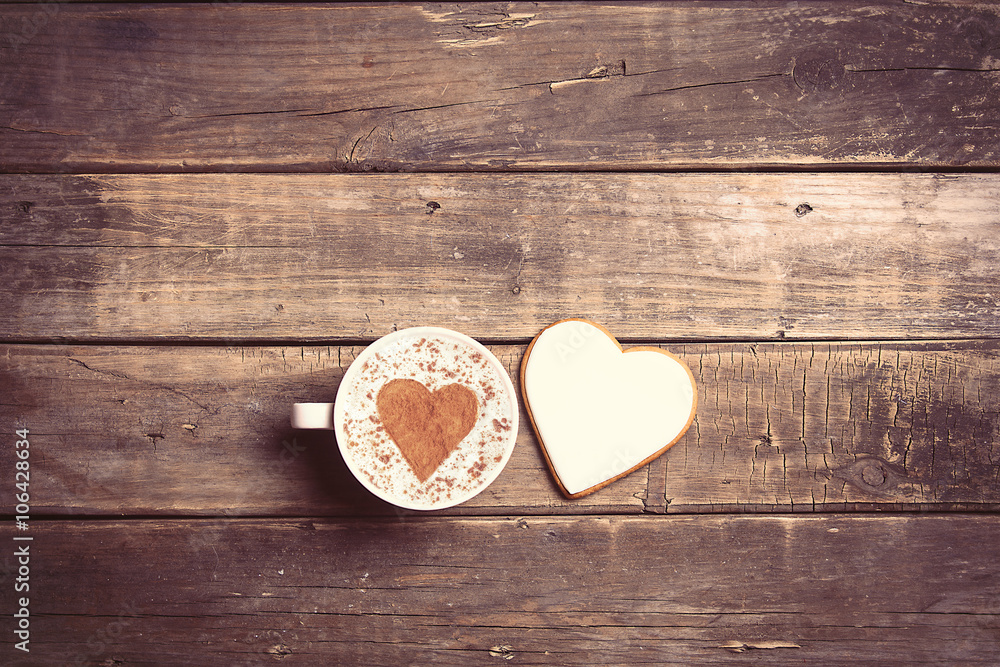 cup of coffee and cookie on the table cup of coffee and cookie on the table