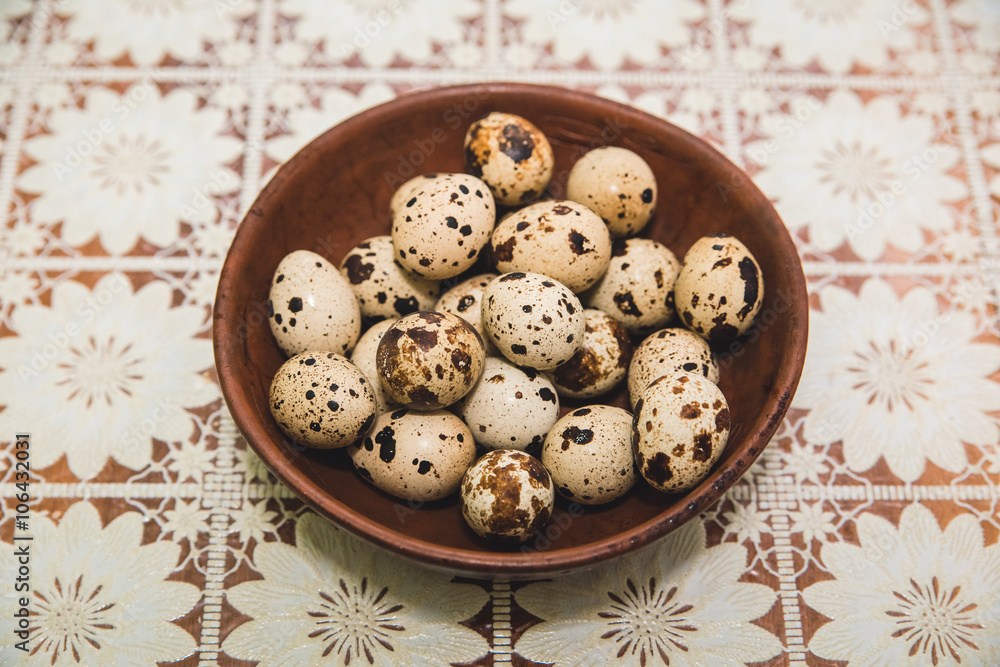 quail eggs are on the openwork tablecloth quail eggs are on the openwork tablecloth