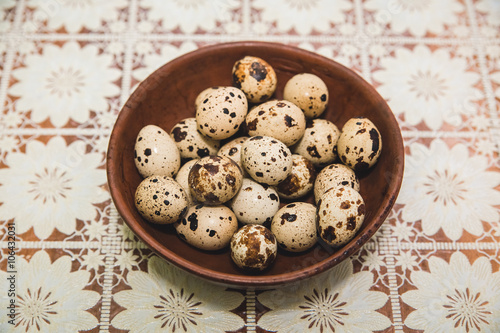 quail eggs are on the openwork tablecloth
