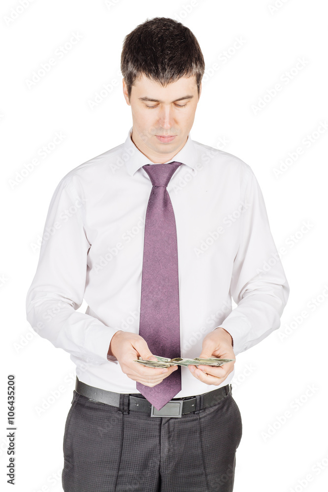 portrait of young business man holding and counting money. isolated on whit background portrait of young business man holding and counting money. isolated on whit background